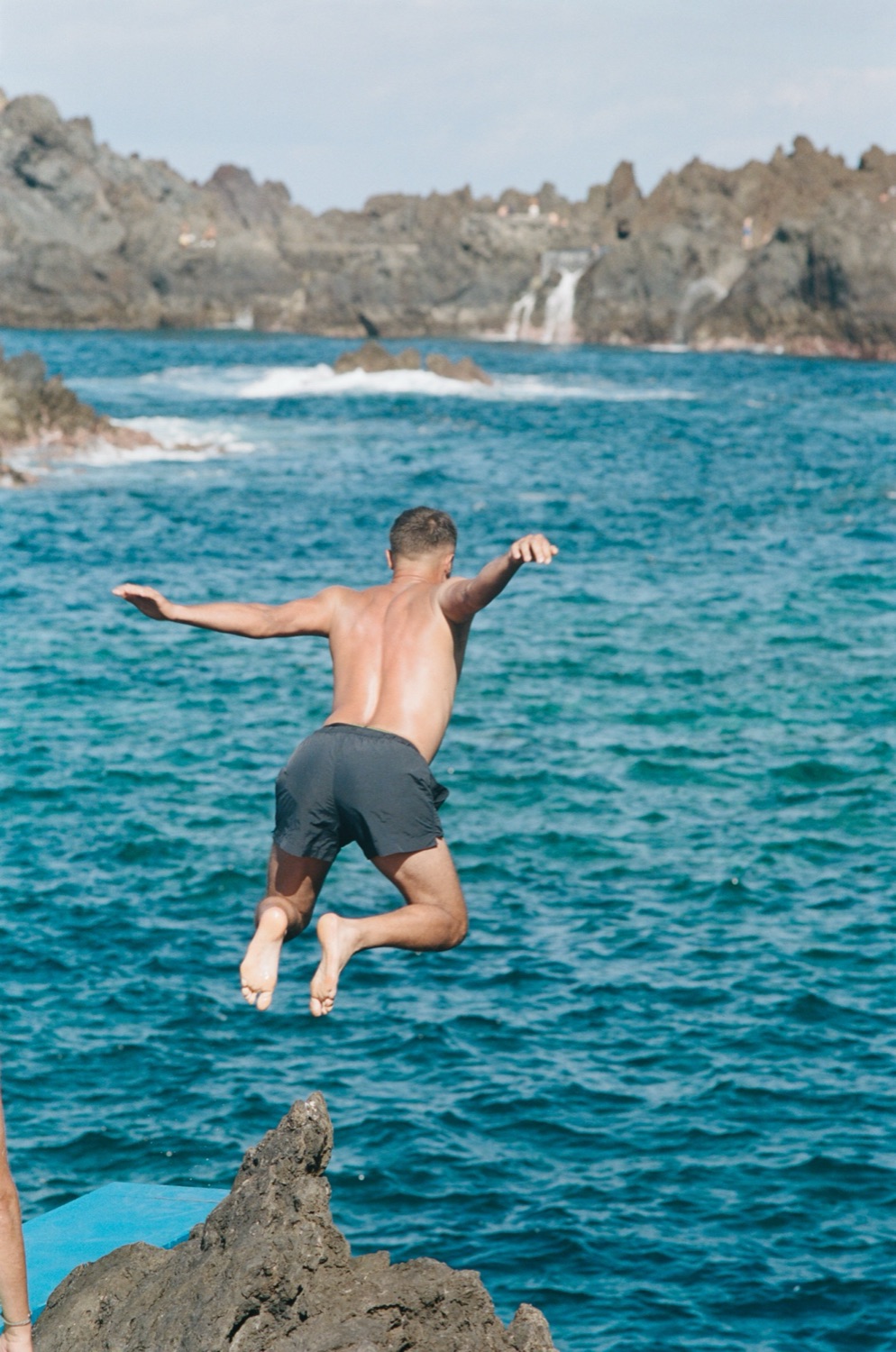 Man jumping into sea, Madeira