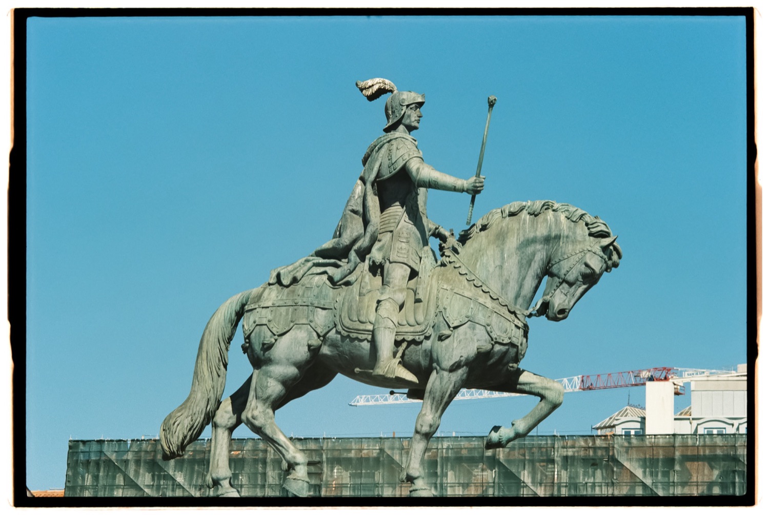 Equestrian statue against blue sky